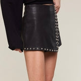 WITH THE BAND BLACK FAUX LEATHER STUDDED SKORT