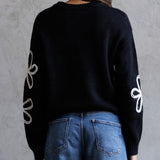 NOTHING TO WORRY ABOUT FLOWER DETAIL KNIT SWEATER