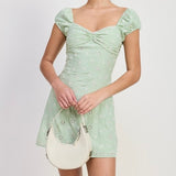 EVERMORE GREEN EYELET MINI DRESS