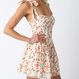 FLOWERS IN YOUR HAIR PATTERNED ROMPER