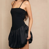 WELL ROUNDED BLACK BUBBLE HEM DRESS
