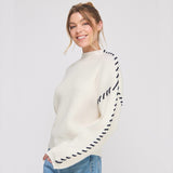 STITCHED UP WHITE AND NAVY MOCK NECK SWEATER