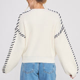 STITCHED UP WHITE AND NAVY MOCK NECK SWEATER