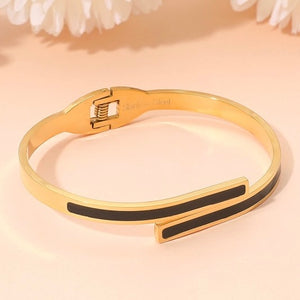 GOLD STAINLESS STEEL BLACK OVERLAP BRACELET