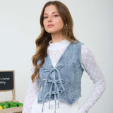 DENIM VEST WITH FLOWER DETAILS