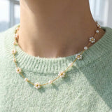 ERYN WHITE BEADED FLOWER NECKLACE
