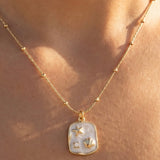 STAINLESS STEEL MOTHER OF PEARL SEA LIFE NECKLACE