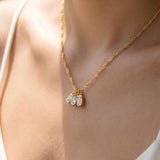 LUNA GOLD TRIPLE CHARM TWISTED NECKLACE