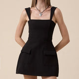 BLACK FLARE DRESS W POCKET ACCENTS