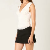 NEED A MINUTE WHITE V NECK TOP