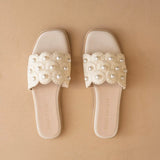 THE CATHLEEN IVORY PEARL RAFFIA SLIDE SANDAL